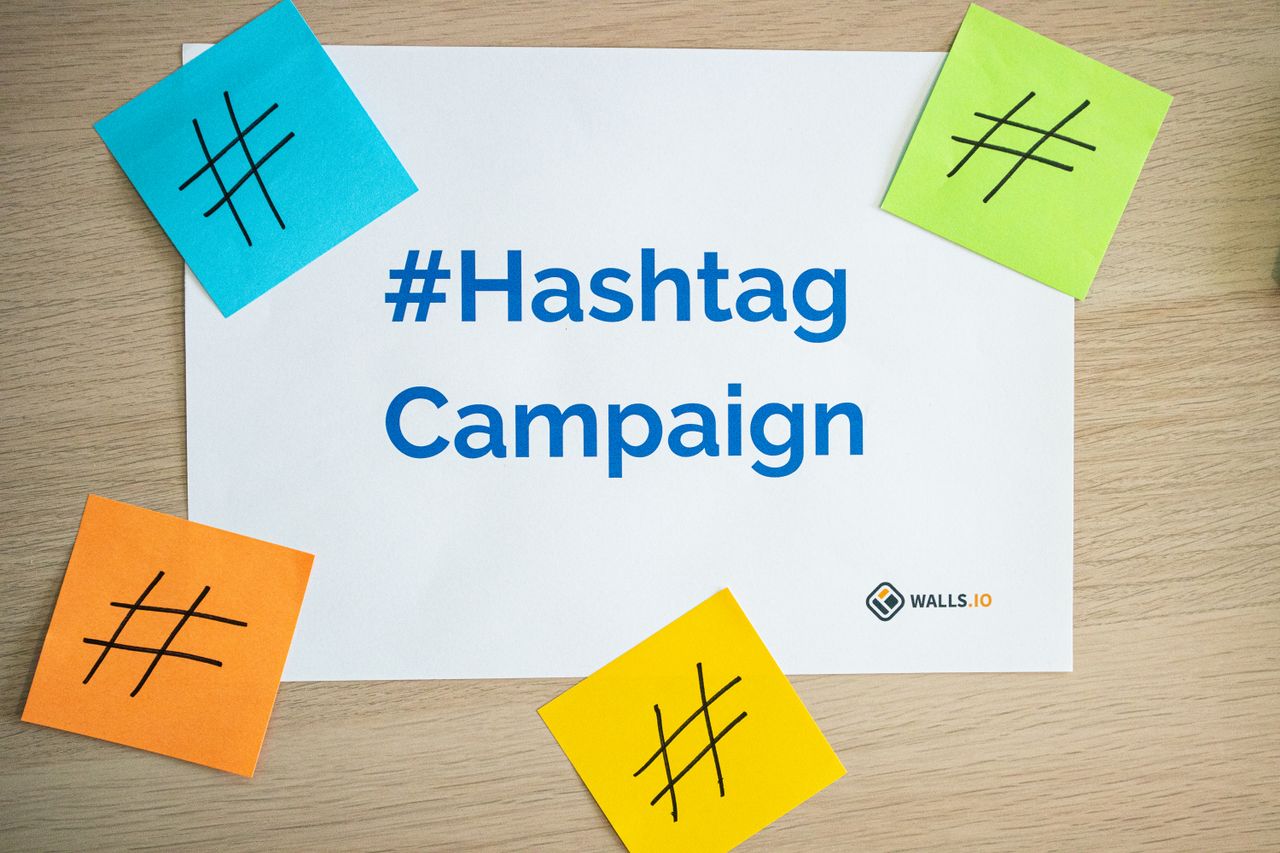 services-02 Colorful sticky notes arranged around a hashtag campaign sign, ideal for social media marketing concepts.